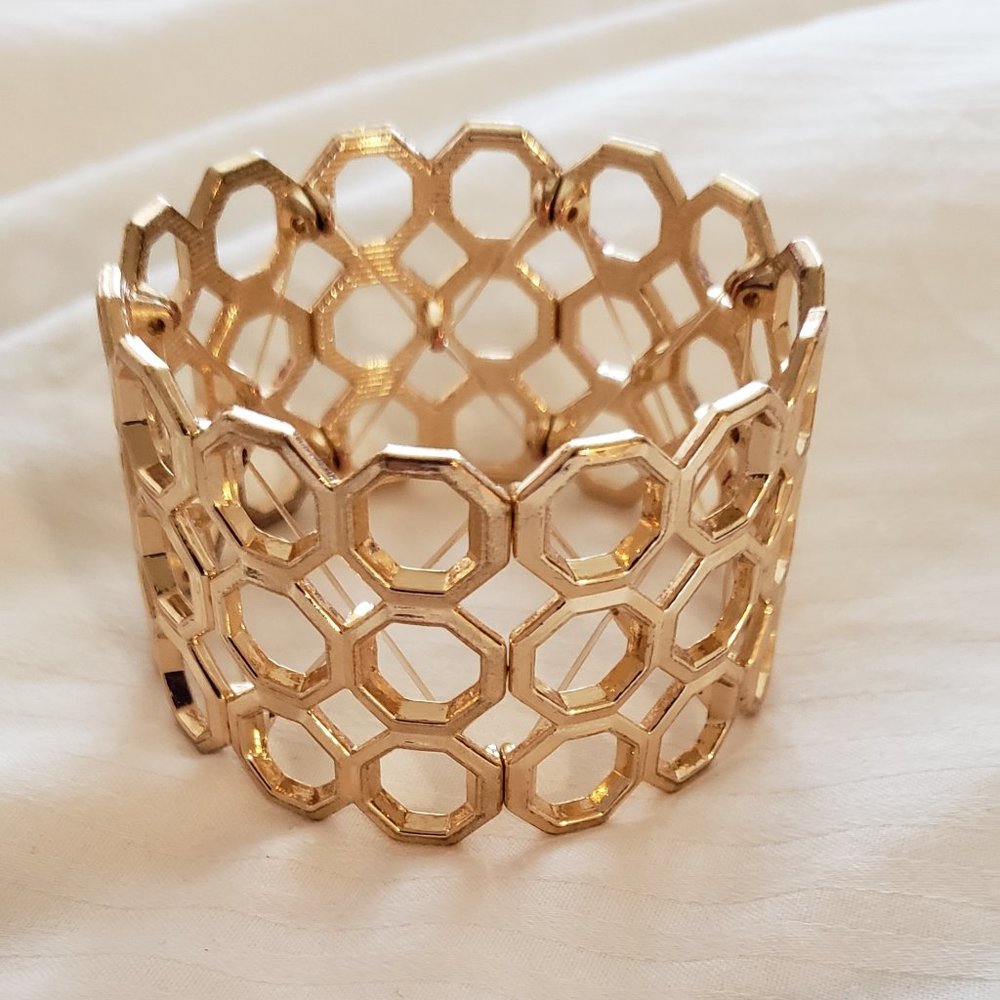 Gold toned cuff